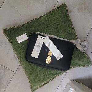 Calvin Klein Black Crossbody Bag with Gold Accents
